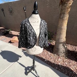 New jacket with lace detail.